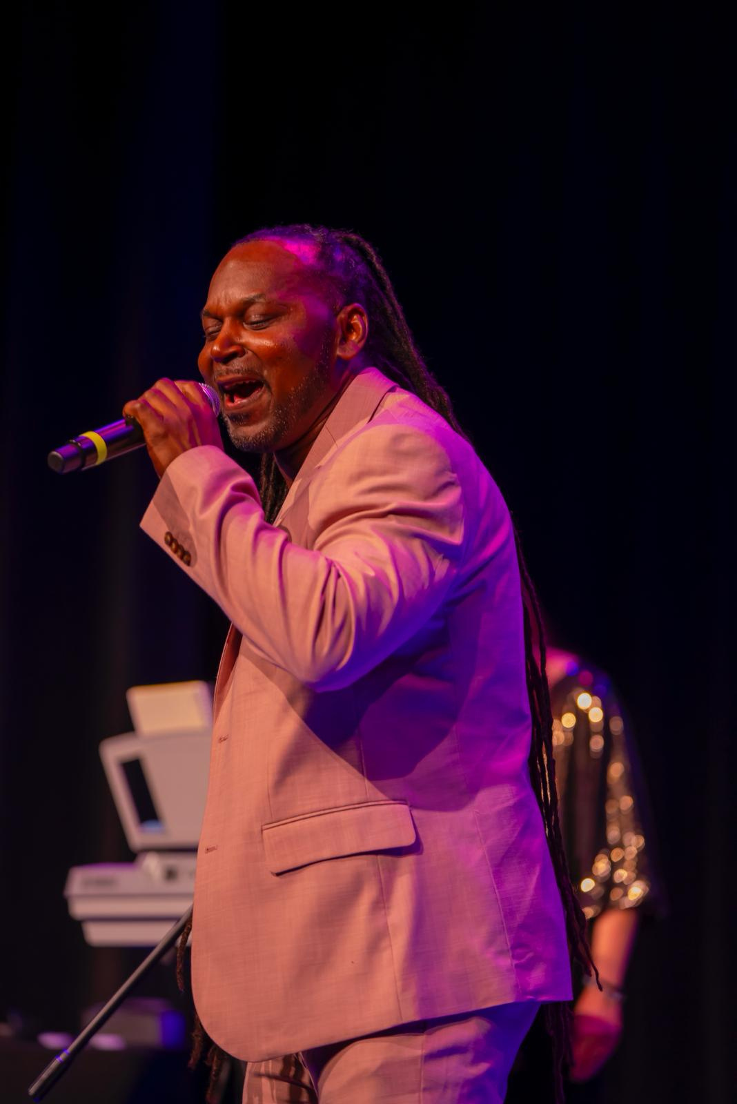 V Merchant performing live on stage